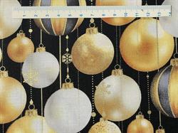 Guld julekugler på sort patchworkstof 